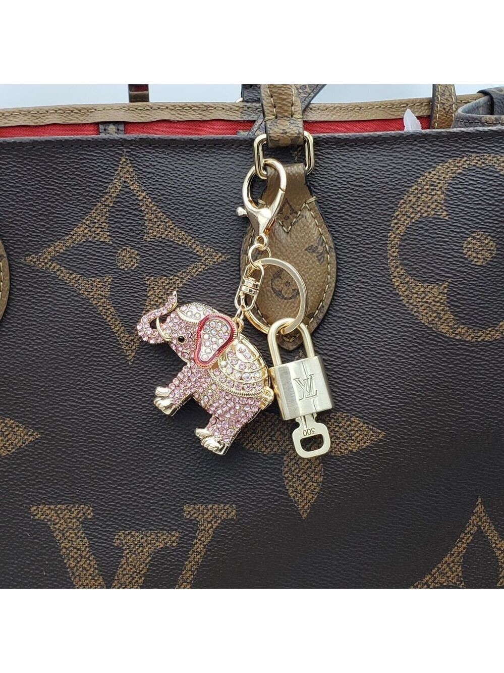 Authentic Louis Vuitton Lock & Key with Unbranded Elephant Charm, Keychain
